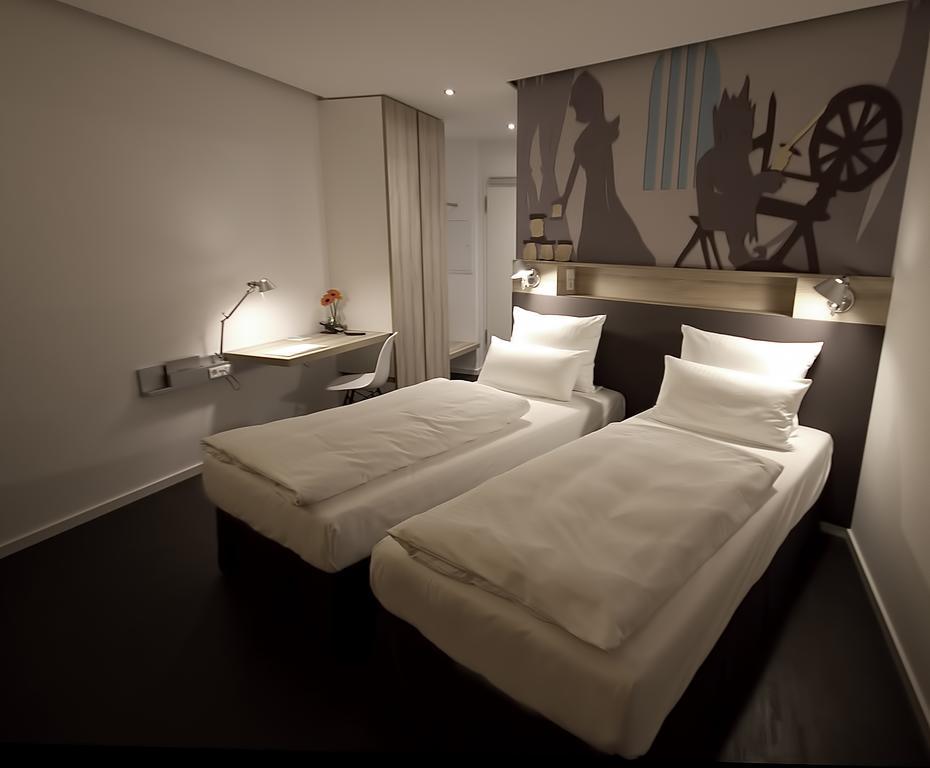 Grimm's Potsdamer Platz Hotel *